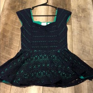 Anthropologie navy and green eyelet peplum shirt